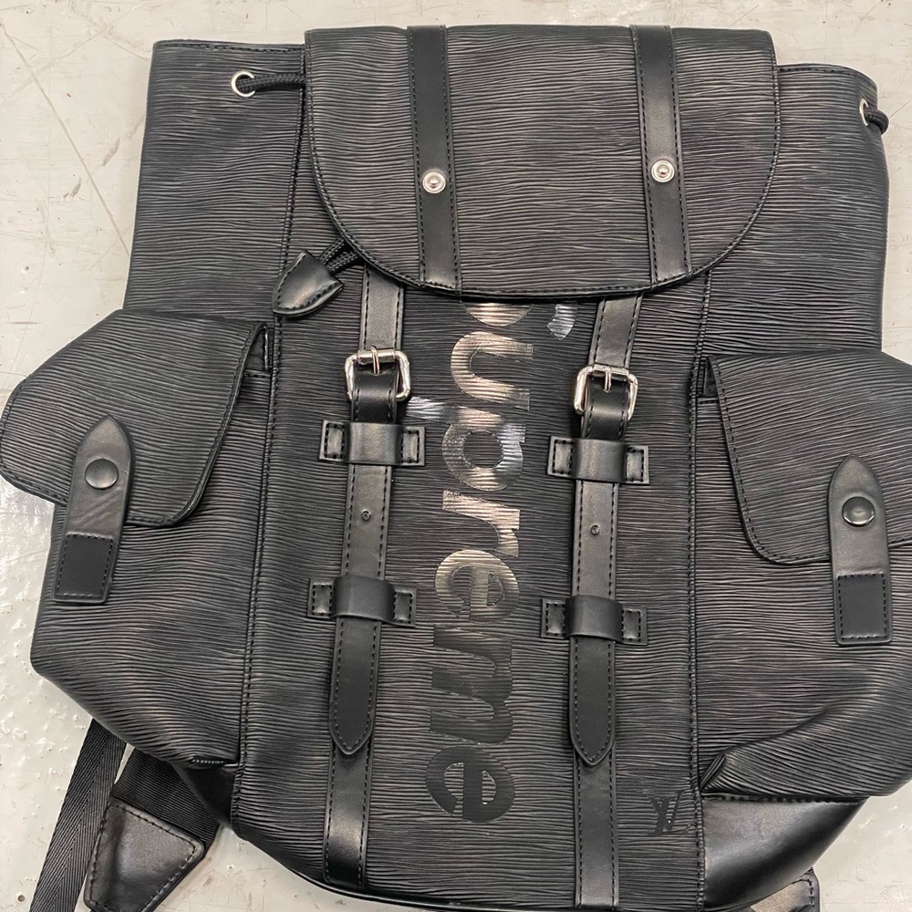 Used Textured Black Backpack